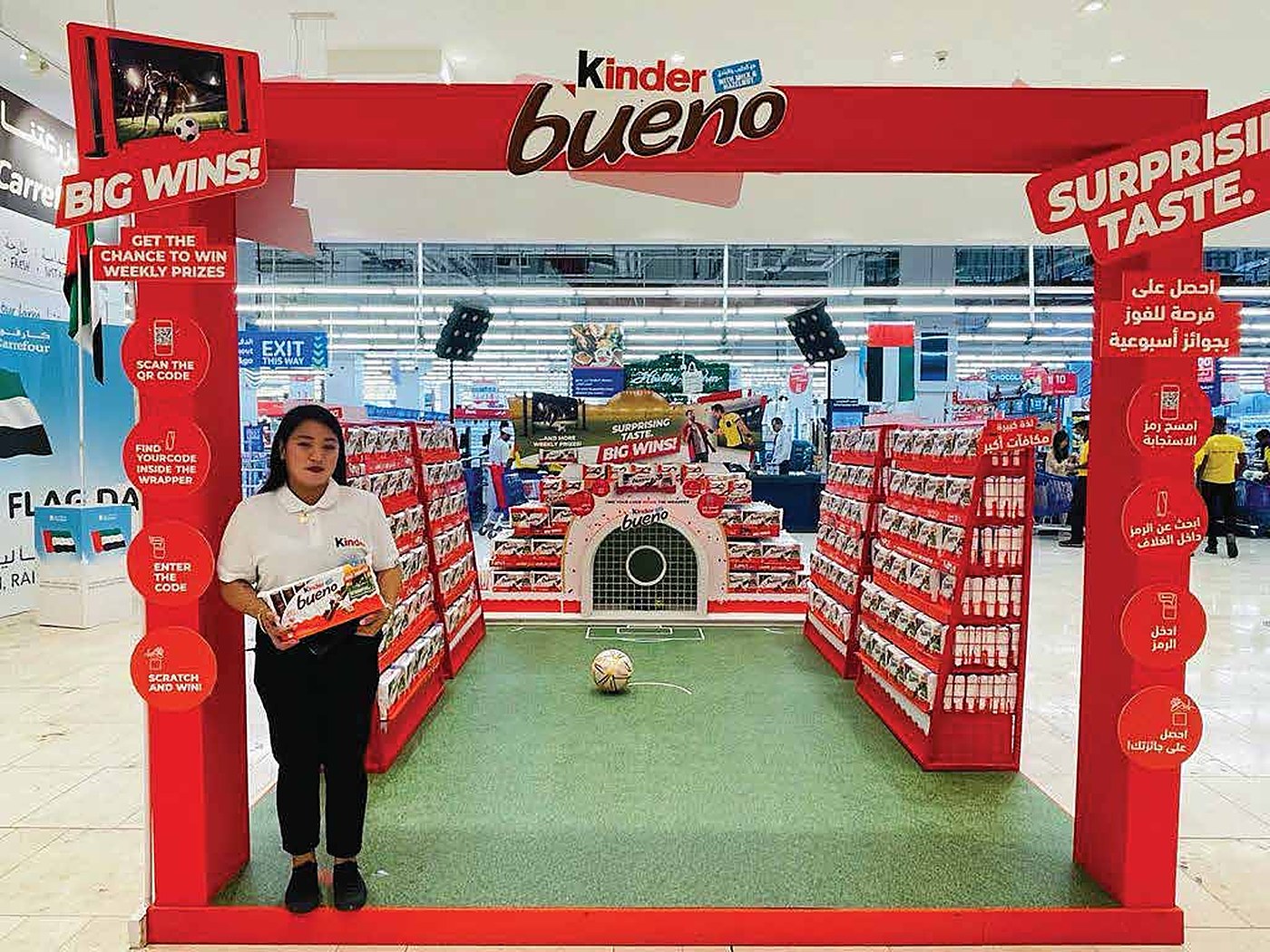 Brand staff running the Kinder Bueno football activation